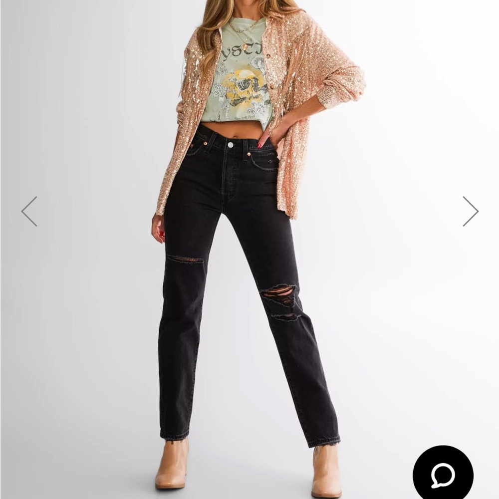 Levi’s black deconstructed  502 jeans